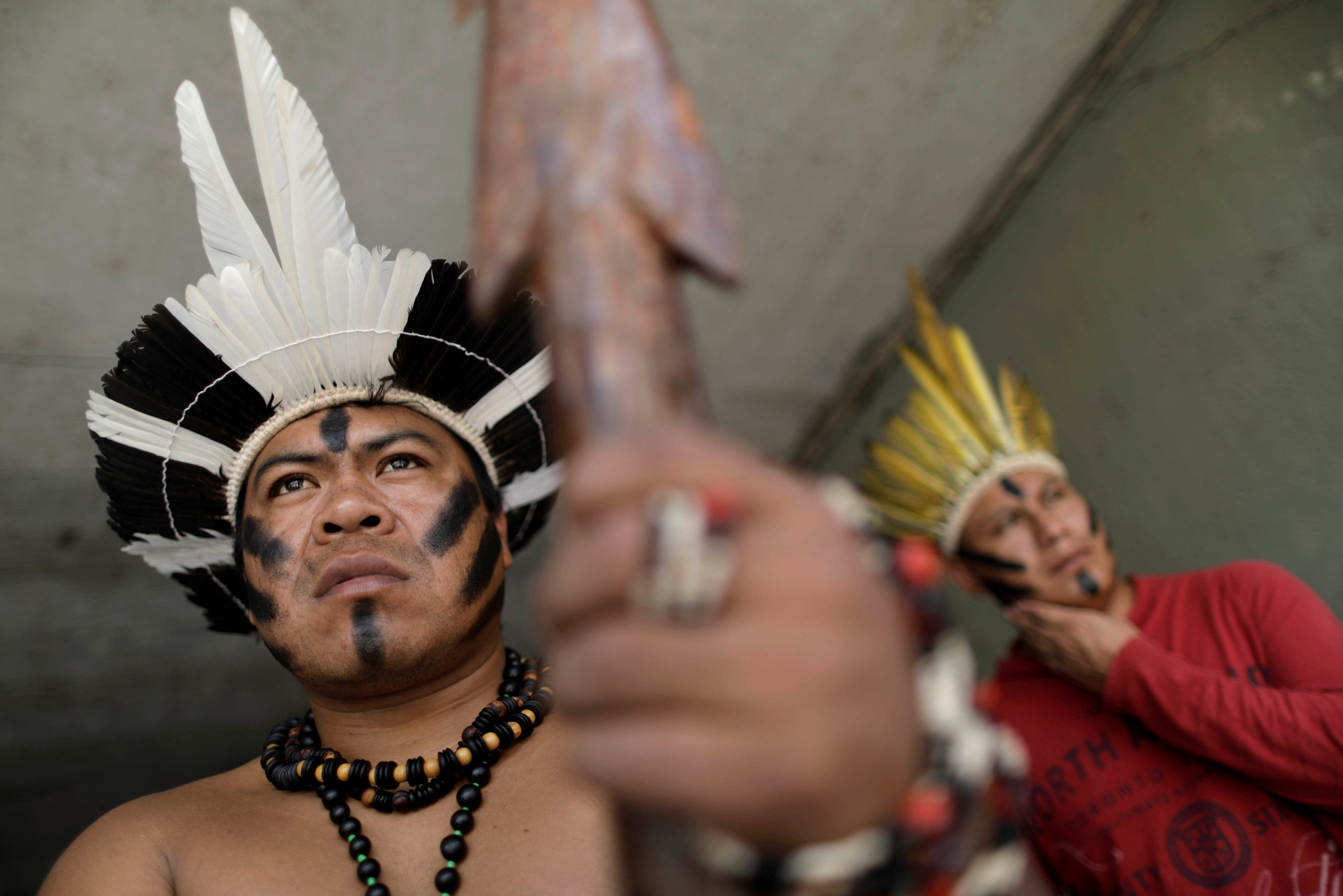 Indigenous people of southern Brazil are seen in Brasilia, Brazil, May 16. Archbishop Salvador Pineiro Garcia-Calderon of Ayacucho, president of the Peruvian bishops' conference, said May 16 that Pope Francis is considering dedicating a meeting of the Synod of Bishops to the concerns of the indigenous people of the Amazon region. (CNS photo/Ueslei Marcelino, Reuters)