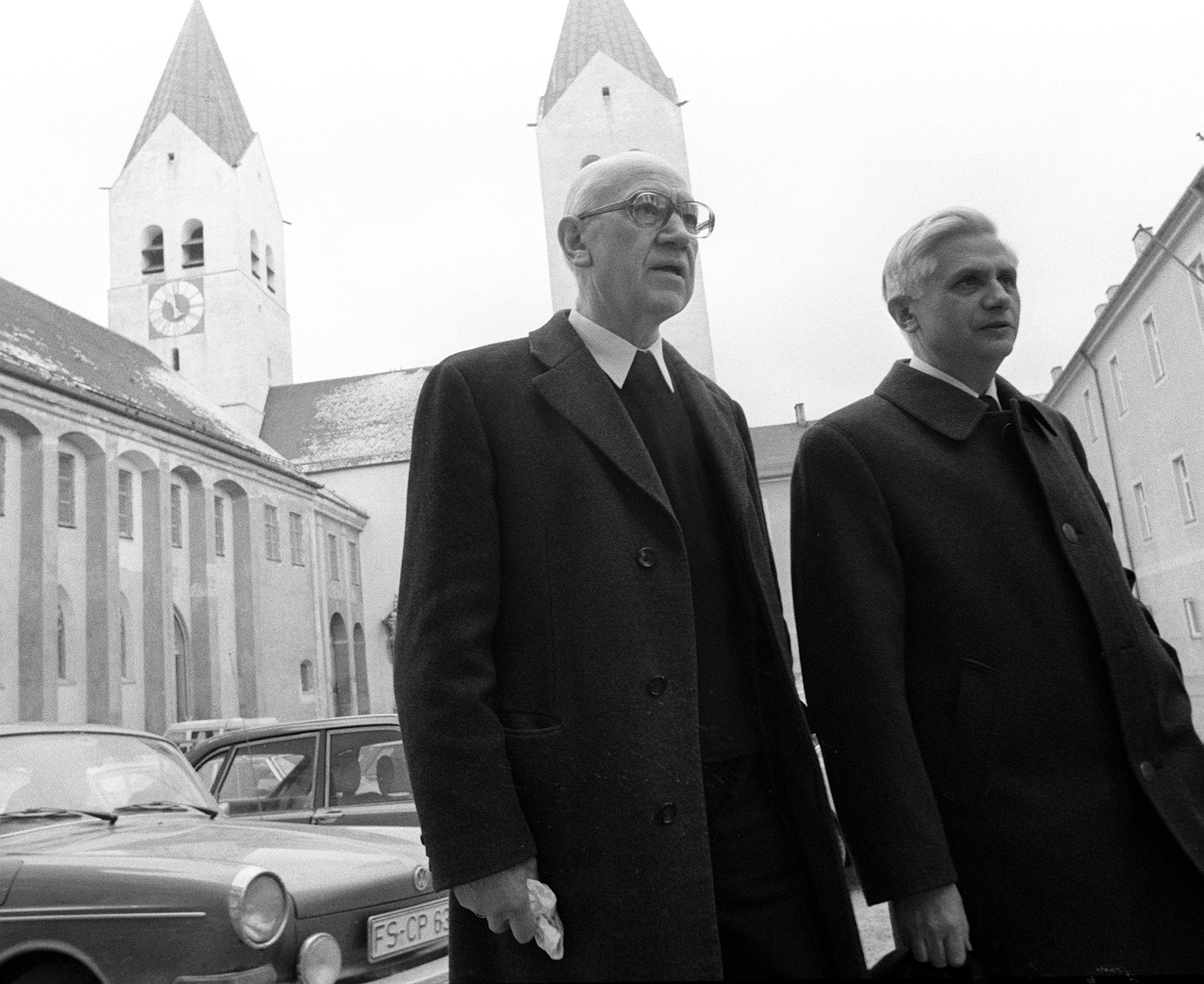 Newly nominated Archbishop of Munich and Freising, Joseph Ratzinger, right, walks with bishop Ernst Tewes in front of the cathedral of Freising, March 31, 1977 (AP Photo/Dieter Endlicher).