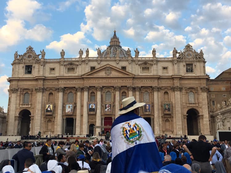 In St. Peter's Square in Vatican City on Oct. 14, 2018, a pilgrim from El Salvador awaits the canonization Mass of St. Óscar Romero, along with six other new saints of the Catholic church. (Photo by author).