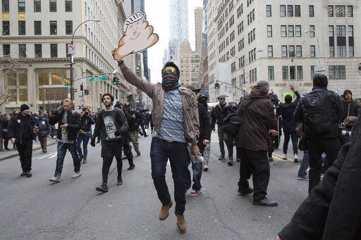 Demonstrators take to the street on during an anti Donald Trump protest, Saturday, March 19, 2016, in New York. Several hundred demonstrators gathered in New York City to protest Republican presidential hopeful Trump (AP Photo/Mary Altaffer).
