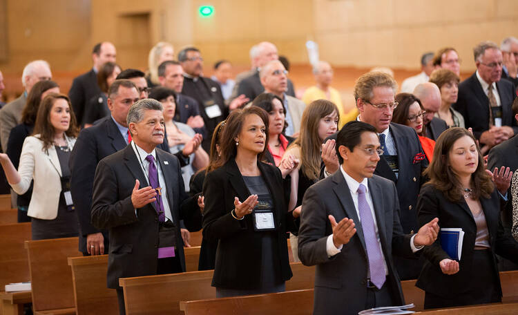 Members of the Catholic Association of Latino Leaders gather for Mass at the start of their annual meeting in Los Angeles on Aug. 22, 2013