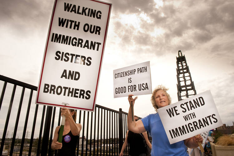 The Supreme Court will decide whether undocumented migrants should be counted when drawing legislative district lines, and the ruling could make the "path to citizenship" an even more contentious issue. (CNS photo/Lisa Johnston, St. Louis Review) 