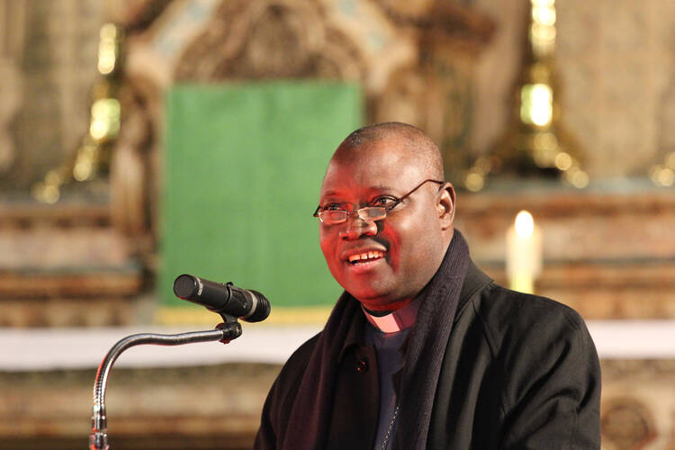 Archbishop from Nigeria speaks in England on country's Ebola efforts and contrasting with its lack of aggression in addressing Islamic extremism (CNS photo/Simon Caldwell)