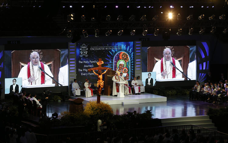 Pope Francis speaks during a meeting with families in the Mall of Asia Arena in Manila, Philippines, Jan. 16. (CNS photo/Paul Haring)