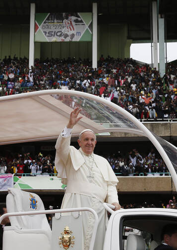 Pope Francis arrives for a meeting with youths at Kasarani Stadium in Nairobi, Kenya, Nov. 27. (CNS photo/Paul Haring)