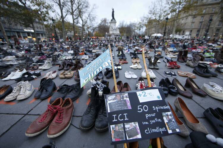 Pairs of shoes are symbolically placed on the Place de la Republique in Paris Nov. 29, ahead of the U.N. climate change conference, known as the COP21 summit, in Paris. (CNS photo/Eric Gaillard, Reuters)