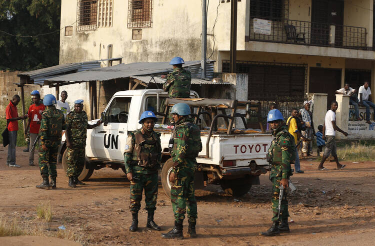 U.N. peacekeepers patrol the street leading to Pope Francis' meeting with the Muslim community at the Koudoukou mosque in Bangui, Central African Republic in November. (CNS photo/Paul Haring)