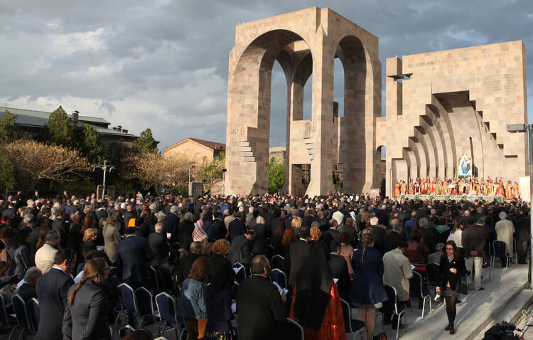 People attend a canonization ceremony for the victims of the Armenian Genocide at the Mother See of Holy Etchmiadzin complex near Yerevan, Armenia. (CNS photo/Vahram Baghdasaryan, EPA) 