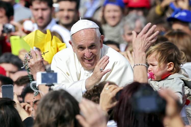 Pope Francis waves as he arrives at a Jubilee audience in St. Peter's Square at the Vatican April 9. (CNS photo/Alessandro Bianchi, Reuters)