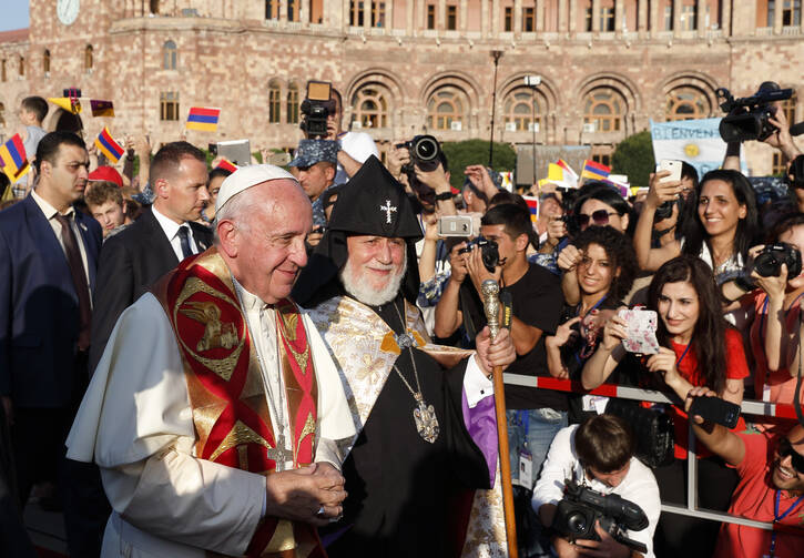  Pope Francis and Catholicos Karekin II, patriarch of the Armenian Apostolic Church, arrive for an ecumenical meeting and prayer for peace in Republic Square in Yerevan, Armenia, June 25. (CNS photo/Paul Haring)
