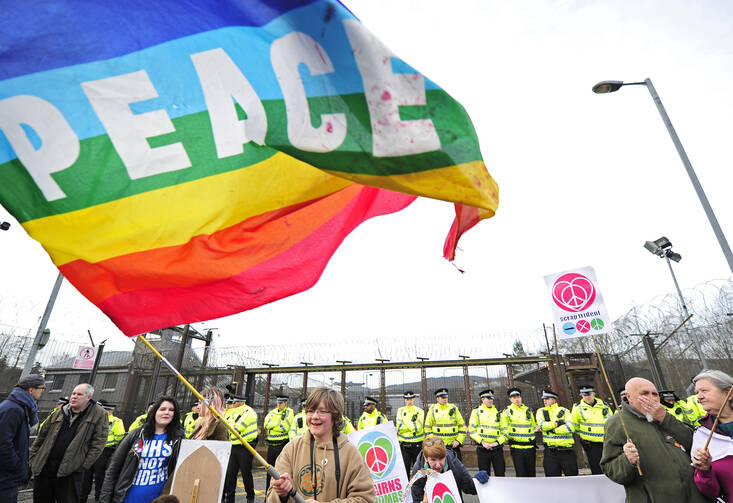 Protesters stage a sit-in at Faslane Naval Base in Helensburgh, Scotland, on April 13, 2015. (CNS photo/Joey Kelly, EPA)