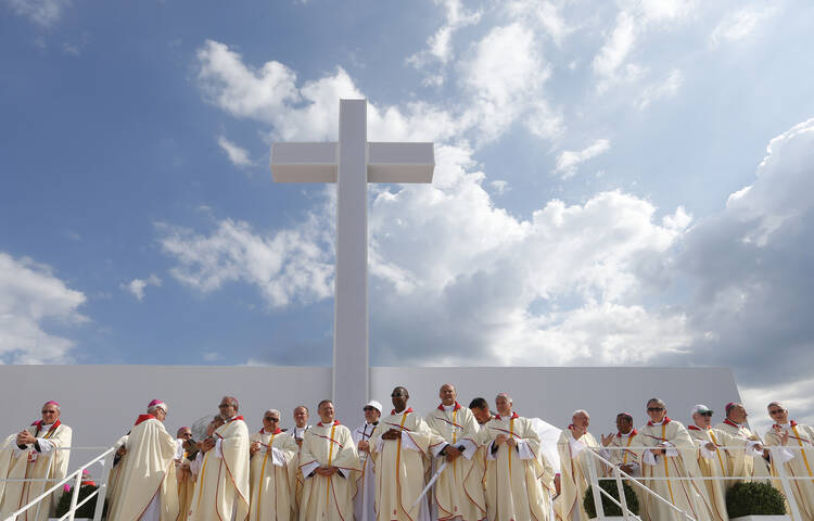 Bishops wait for the start of Pope Francis' celebration of the closing Mass of World Youth Day at Campus Misericordiae in Krakow, Poland, July 31. (CNS photo/Paul Haring)