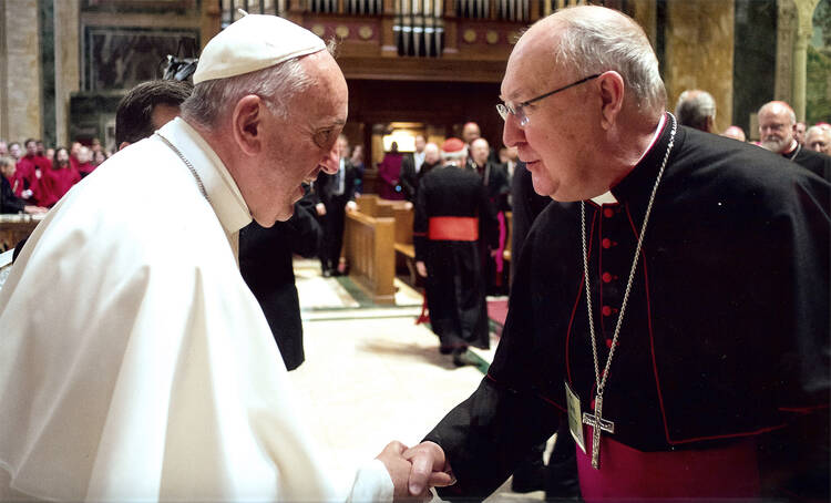 Pope Francis greets Bishop Kevin J. Farrell of Dallas in Washington in September 2015. Pope Francis has named the Texas bishop to head the Vatican's new office for laity, family and life. (CNS photo/courtesy The Texas Catholic)