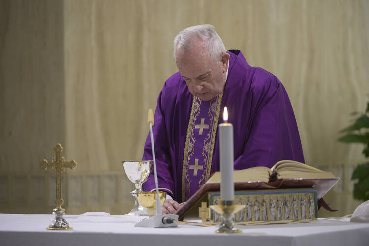  Pope Francis celebrates Mass in the chapel of the Domus Sanctae Marthae at the Vatican March 27, 2020. (CNS photo/Vatican Media)