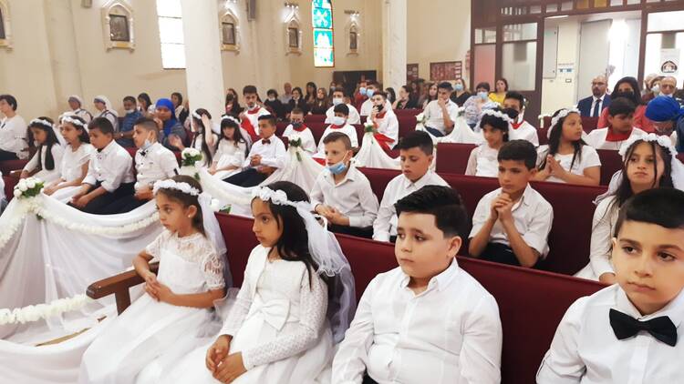 Young people are pictured during confirmation at Holy Family Catholic Church in Gaza June 16, 2021. (CNS photo/courtesy Holy Family Parish, Gaza)