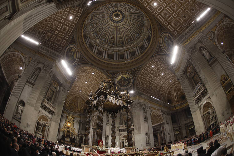 Pope Francis celebrates Christmas Eve Mass in St. Peter's Basilica in 2019. Vatican prosecutors have ordered the seizure of documents and computers from the administrative offices of St. Peter’s Basilica in an apparently new investigation into financial irregularities in the Holy See. (AP Photo/Alessandra Tarantino)