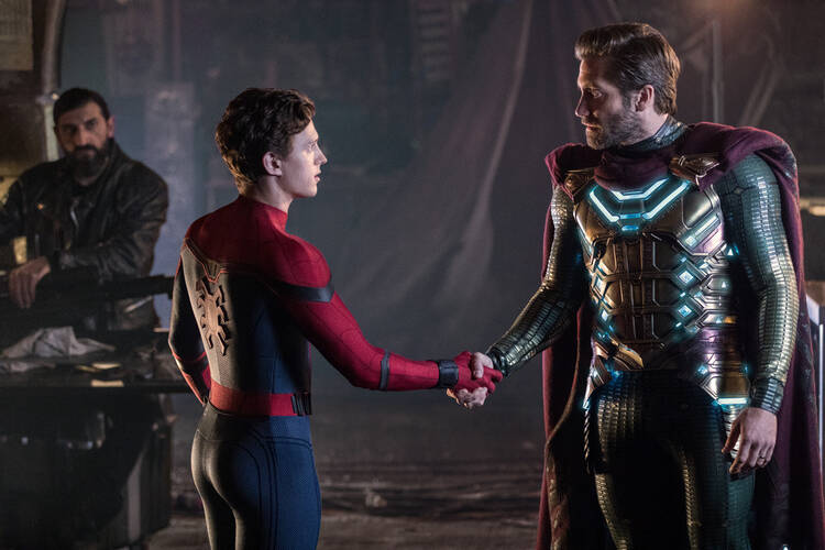 In "Spider-Man: Far From Home," Peter Parker (Tom Holland), left, greets Quentin Beck (Jake Gyllenhall), right. Though Beck claims to be a hero, he is secretly the supervillain Mysterio. (Photo: Sony Pictures)