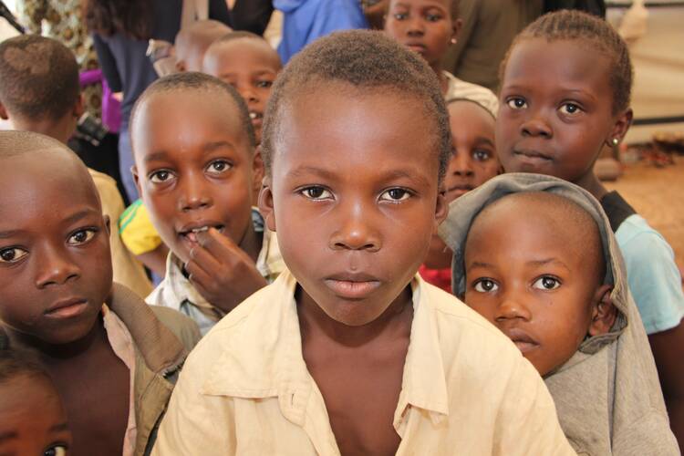 Children at a displaced persons camp in Bangui last year. Many of their fathers had been missing for months and were presumed vicitms of a Seleka rampage in December 2013. (photo by Kevin Clarke)