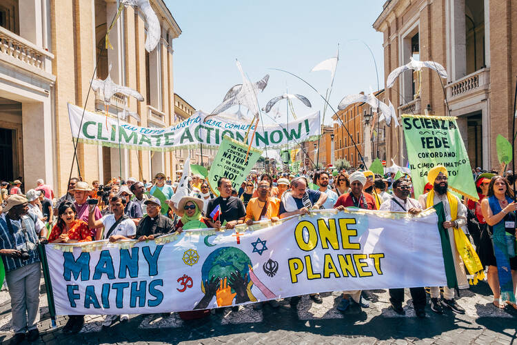 Una Terra Una Famiglia Humana Climate Change March | Vatican City June 28 (Mat McDermott)