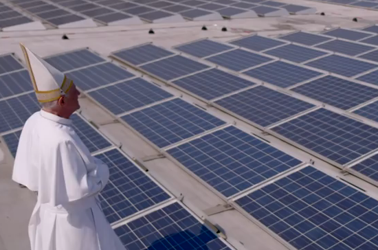 An actor playing Pope Francis blesses an array of solar panels in the satirical online video "Pope Francis: The Encyclical."