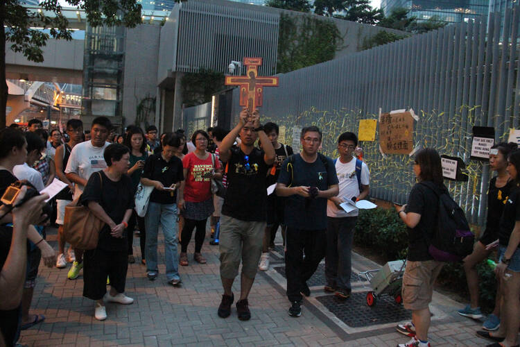 Catholic youths pray for democracy of Hong Kong (CNS photo/Francis Wong).