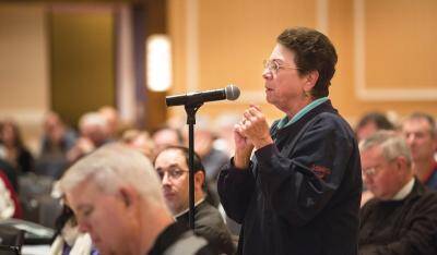 CANONICAL QUESTION. Barbara Anne Cusack, chancellor of the Archdiocese of Milwaukee, asks a question about marriage on oct. 16 during the 76th annual Canon Law Society of America convention in St. Louis.