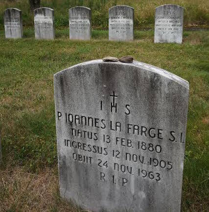 The gravestone of Father John LaFarge, a Jesuit priest, longtime associate editor of America, and tireless advocate for racial justice. (Photo courtesy of Kevin Ahern)