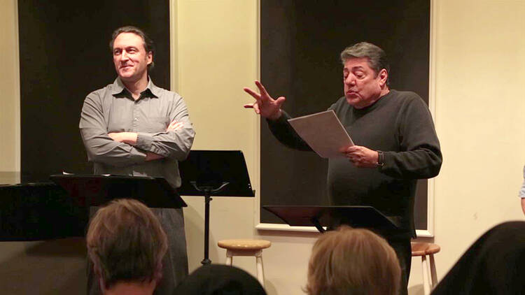 George Drance, S.J., left, as the Narrator and Richard Zavaglia as Stevens in a staged reading of "Mr. Blue."