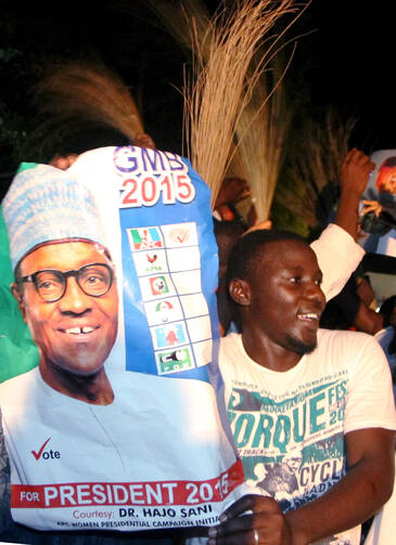 Supporters of President-elect Muhammadu Buhari celebrate in Abuja, Nigeria, March 31. (CNS photo/Stringer, Reuters) 