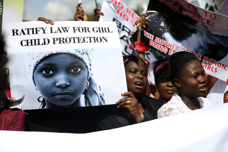 A protest in Lagos, Nigeria, last May to demand the release of abducted high school girls. (CNS photo/Akintunde Akinleye, Reuters) 
