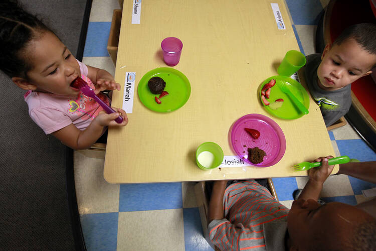 Snack time at a Head Start anti-poverty program in Baltimore