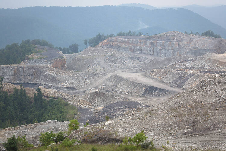 RESOURCE CURSE. A mountaintop removal near Charleston, W.Va. The technique has flattened more than 500 mountains throughout central Appalachia.