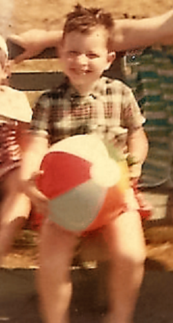 The author as a 5 year old, with the whole world in his hands (even if it was a beach ball)