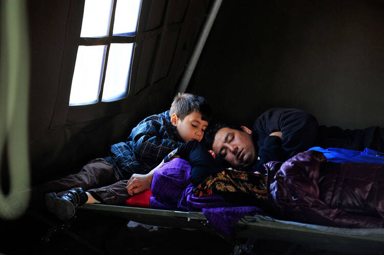 In Croatia, a refugee family rests in the UNICEF-supported Family Area at the reception centre in Opatovac. Photo: UNICEF/ Tomislav Georgiev