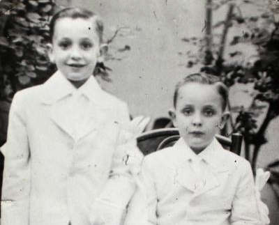 Jorge Mario Bergoglio, now Pope Francis, is pictured, left, with his brother Oscar following their first Communion in this 1942 family photo. (CNS photo/courtesy of Maria Elena Bergoglio via Reuters)
