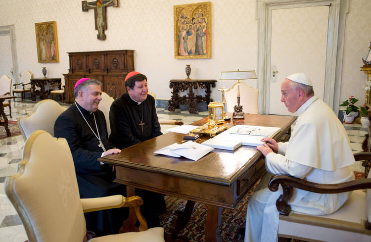Archbishop Carballo and Cardinal Braz de Aviz with Pope Francis in an October meeting.