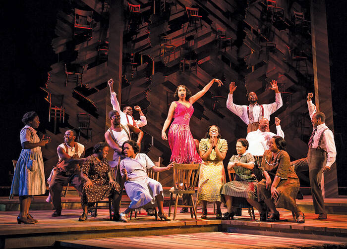 STANDING TALL. Jennifer Hudson, center, in “The Color Purple”