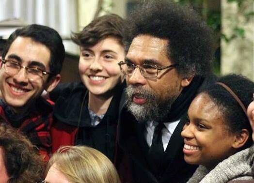 Dr. Cornel West poses with students after his talk at Maryhouse Catholic Worker on Nov. 8, 2013. Photo courtesy of Palina Prasasouk.