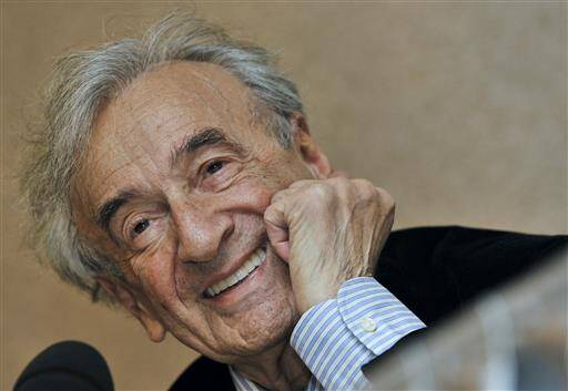  In this Dec. 10, 2009 file photo, Elie Wiesel smiles during a news conference in Budapest, Hungary (AP Photo/Bela Szandelszky, file).