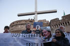 Clerical sex abuse survivors and their supporters rally outside Castel Sant'Angelo in Rome on Feb. 21. (CNS photo/Paul Haring) 