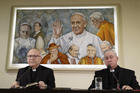  Auxiliary Bishop Fernando Ramos Perez of Santiago, Chile, and Bishop Juan Ignacio Gonzalez Errazuriz of San Bernardo, Chile, lead a press conference at the Vatican May 14. Pope Francis is meeting this week with Chile's bishops in the wake of a clerical sex abuse crisis. (CNS photo/Paul Haring)