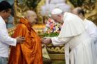 Pope Francis greets Bhaddanta Kumarabhivasma, chairman of the supreme council of Buddhist monks, during a Nov. 29 meeting with monks of the council at the Kaba Aye Pagoda in Yangon, Myanmar. (CNS photo/Max Rossi, Reuters)