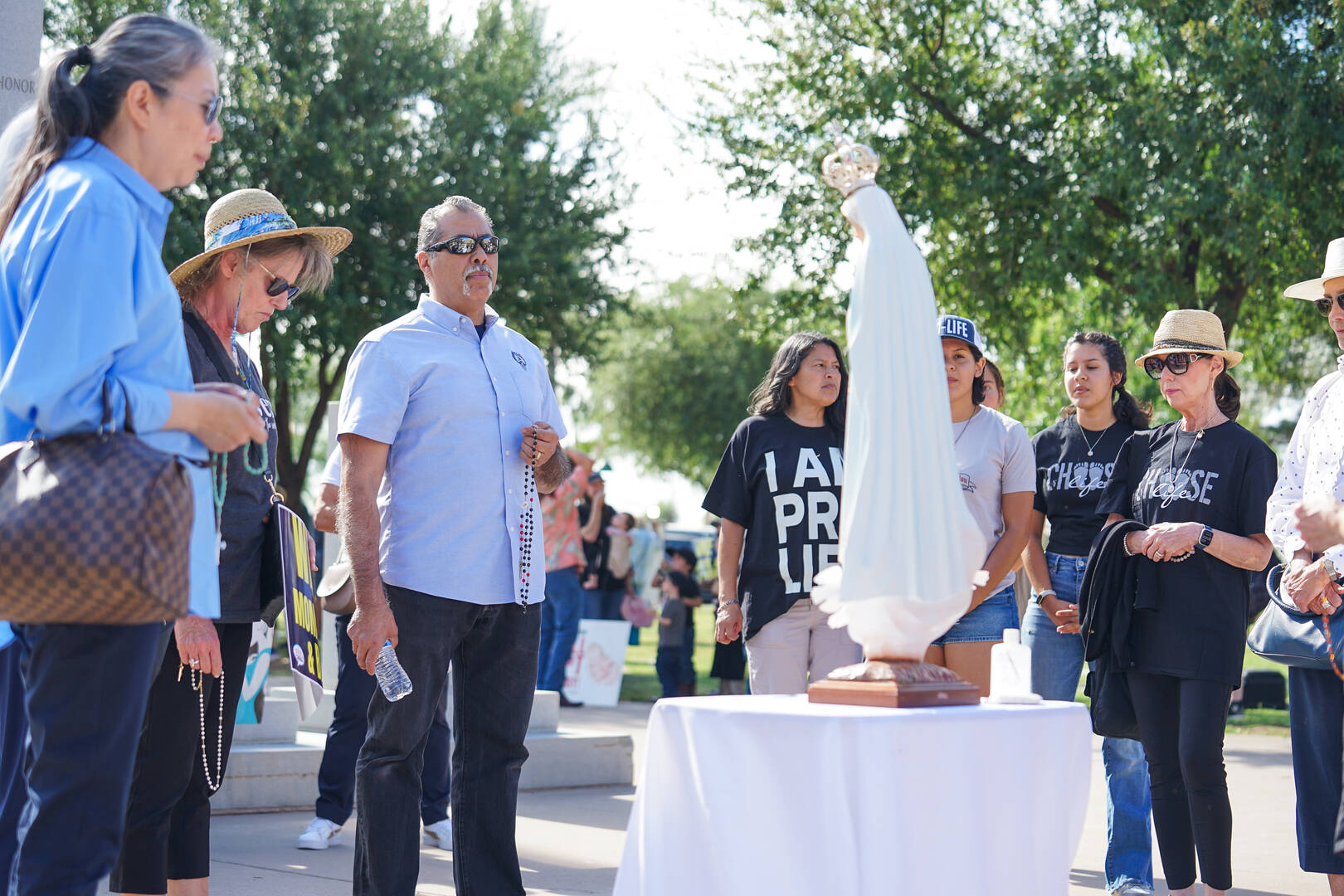 Jesse Romero, a popular Catholic evangelist and retreat leader, led a group praying the rosary April 25 at the Arizona Capitol. Mr. Romero said the church’s opposition to abortion has been clear since 70 A.D., as it was articulated in the Didache. (photo: J.D. Long García)