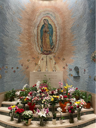 Our Lady of Guadalupe, Patroness of Americas chapel on main level of the basilica. A handwritten prayer of Our Lady of Guadalupe is written in Spanish and English followed by the story surrounding the appearance of our Lady of Guadalupe. The chapel is a gift of the Archdiocese of Boston and Richard Cardinal Cushing (photo by author).