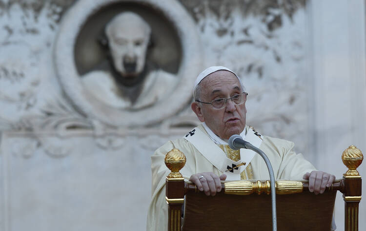 Pope Francis gives the homily as he celebrates Mass at the Verano cemetery in Rome Nov. 1, the feast of All Saints. (CNS photo/Paul Haring) 