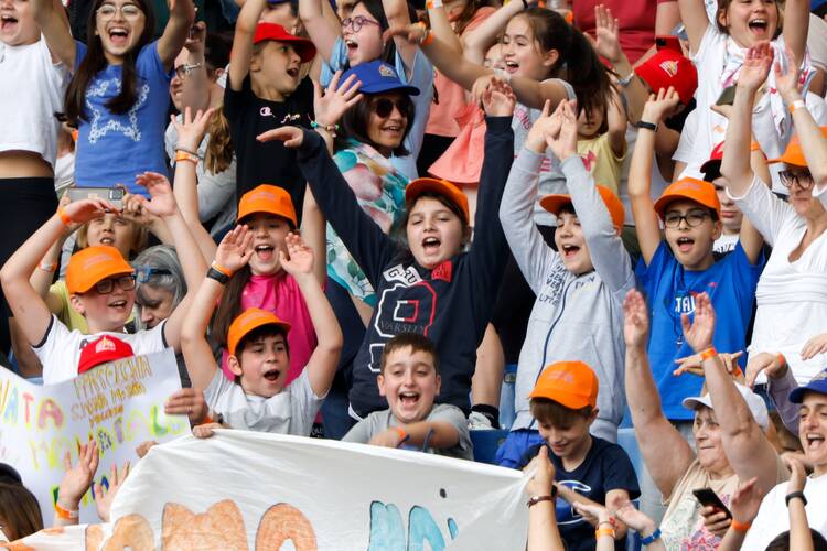 Children cheer as they celebrate the first World Children's Day at the Olympic Stadium in Rome, Italy, May 25, 2024. (CNS photo/Lola Gomez)