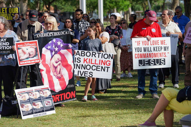 Pro-life advocates gathered April 25 at the Arizona State Capitol to show their support for a 1864 law only allowed abortion in cases where the mother’s life was in danger. The state government repealed the law in May. 