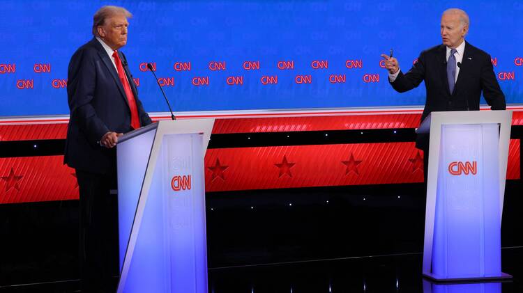 Former President Donald Trump and President Joe Biden participate in their first U.S. presidential campaign debate in Atlanta June 27, 2024. (OSV News photo/Brian Snyder, Reuters)
