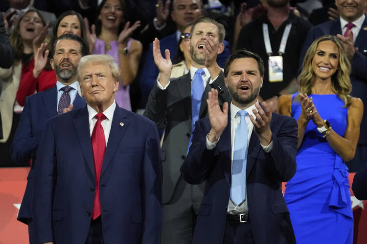 Former President Donald Trump appears with vice presidential candidate J.D. Vance during the Republican National Convention on July 15, 2024, in Milwaukee. (AP Photo/Paul Sancya)