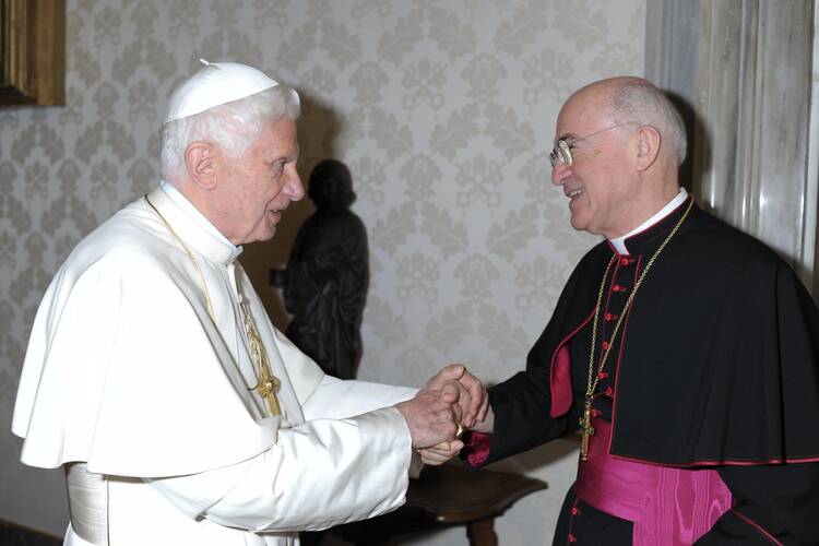 Pope Benedict XVI meets Italian Archbishop Carlo Maria Vigano, the new apostolic nuncio to the United States, at the Vatican in this Nov. 7, 2011, file photo. At that time Archbishop Vigano was preparing to leave the Vatican to serve as apostolic nuncio in the United States. (CNS photo/L'Osservatore Romano)